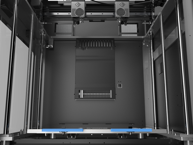 The build chamber, extruders, guide rails, build plate and air filters of the Creator 4-A HT printer